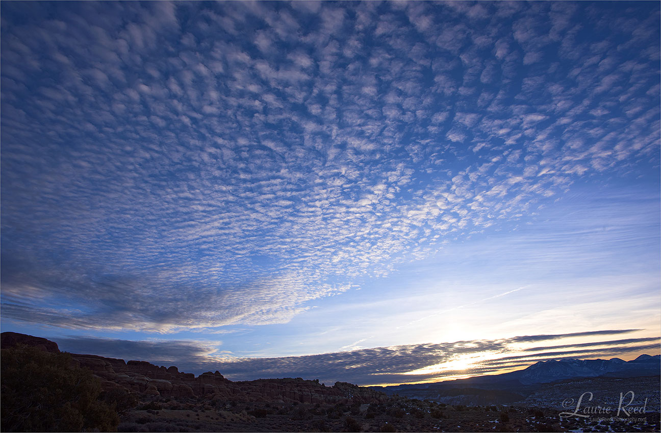 Clouds at Arches N.P. - © Laurie Reed Photography